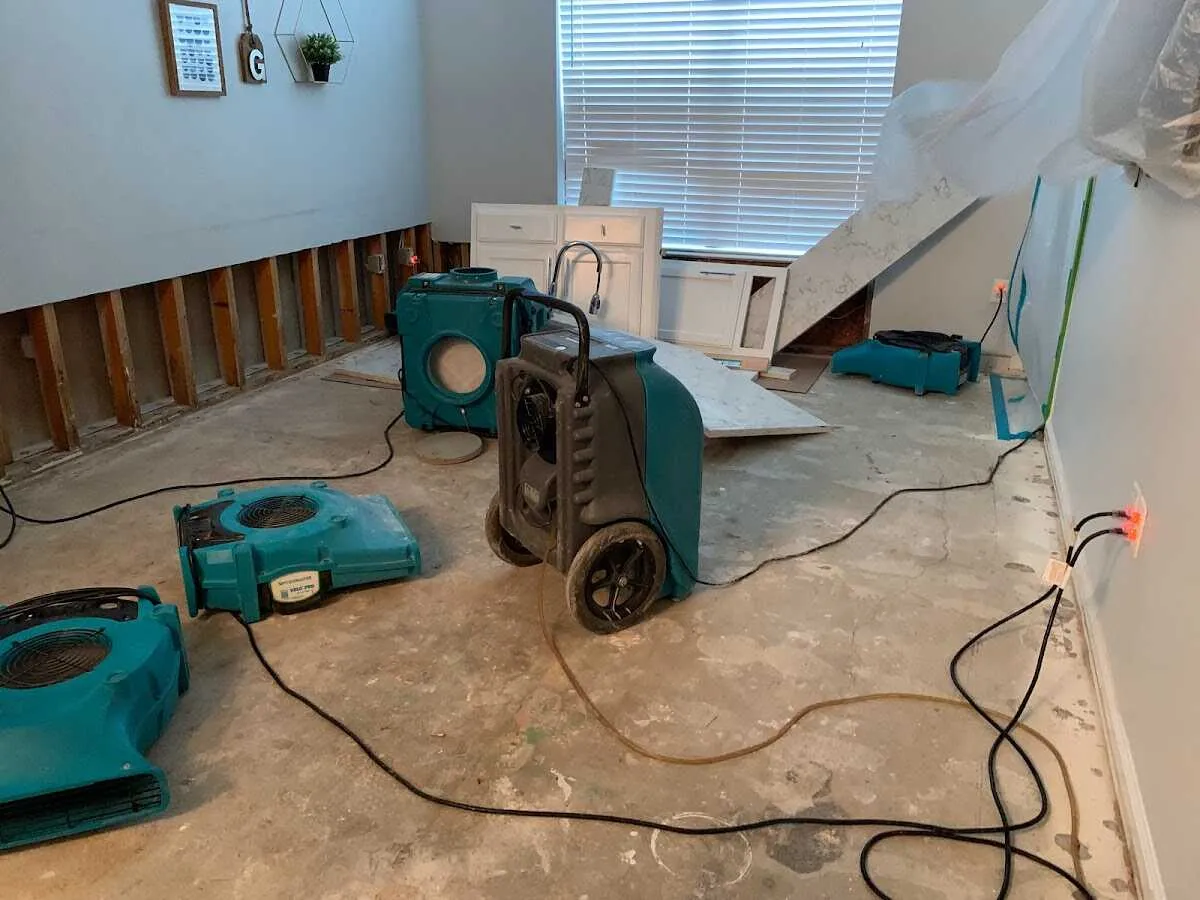Dehumidifier in flood-cut room for Water Damage Restoration in Medina